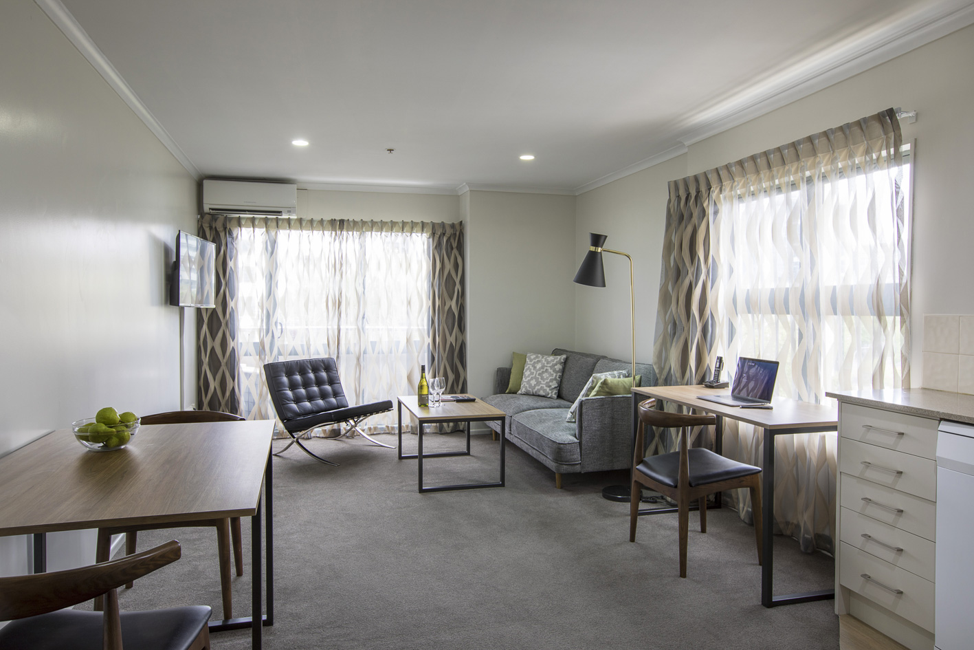 Budget hotels interior design of Leather upholstery headboard bed with Wood structure desk and tables5.jpg